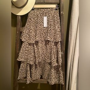 NWT animal print ruffle midi skirt. Made by Goodnight Macaroon and is a size S.